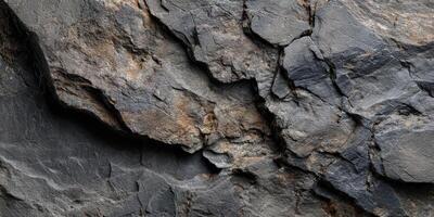 Close up detailed texture of natural dark rocks photo