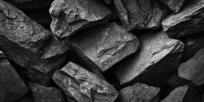 Close up texture of rough natural black rocks photo