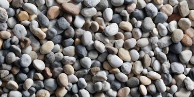 Close up of smooth natural river stones texture surface photo