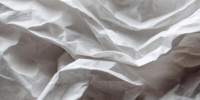 Close up of textured crumpled white paper surface photo