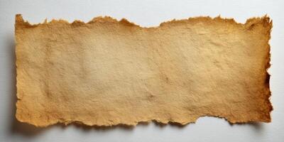 Natural aged parchment paper with rough burnt edges photo