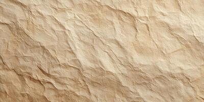 Textured crumpled beige paper background surface photo
