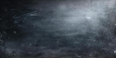 Dark grunge textured black chalkboard background with scratches photo
