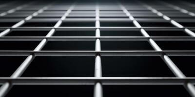 Close up perspective of metal grid fence structure photo