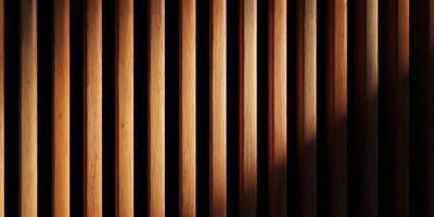 Abstract wooden vertical slats with shadow pattern photo