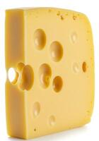 A close up shot of a delicious block of swiss cheese with multiple holes. photo
