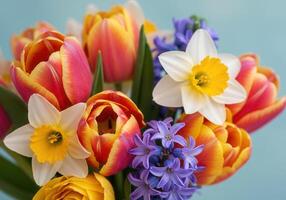 Close-up of a vibrant bouquet, featuring colorful tulips and other spring blooms. photo