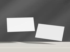 Dark grey floating business card mockup pair with soft diffused shadows photo
