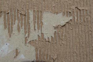Abstract ripped brown cardboard paper texture background design element photo