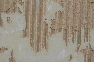 Abstract torn brown cardboard paper texture background design element photo
