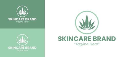 Professional and Elegant Skincare Brand Logo Design with Green Leaf Icon vector