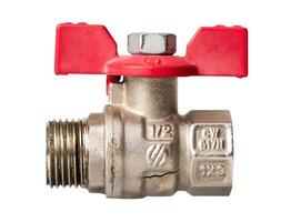 Close-up of a cracked metal ball valve with red handle, showing damage and corrosion, isolated on white background. photo