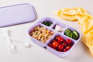 Healthy business and school lunchbox for lunch snack on table photo