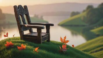 Wooden Chair on Green Hillside Overlooking Lake with Autumn Leaves photo