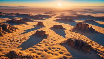Sunrise Over Desert Landscape with Rock Formations and Winding Trail photo