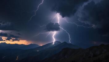 Lightning Strikes Mountain Range During a Dramatic Storm at Night photo