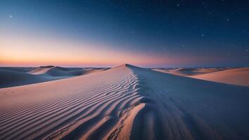 Sand Dunes at Night Under a Starry Sky with Soft Light photo