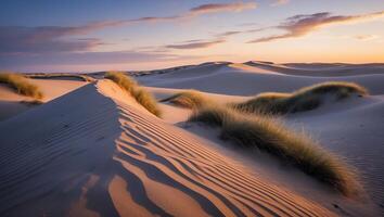 Sand Dunes Landscape with Grass at Sunset and Colorful Sky photo