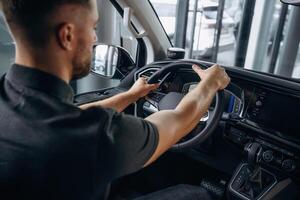 Man is sitting in the car,,, driver photo