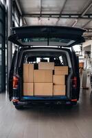 Vehicle with bunch ,,of boxes, conception of delivery photo