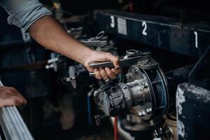 Close, up ,view of man's hand that is checking the vehicle photo