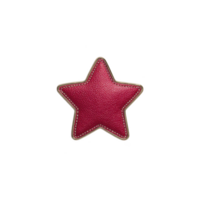 Red leather star shaped patch with detailed stitching on edges, isolated on transparency background, showcasing craftsmanship and texture png