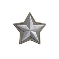 Silver embroidered star patch with gray border, symbolizing achievement or rank, is displayed on transparency background. detailed stitching gives it textured appearance png