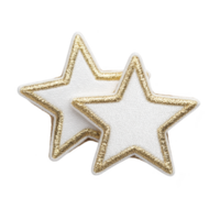 Two white star shaped patches with gold embroidered edges are displayed on transparency background, showcasing simple and elegant design png