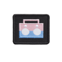 This features rectangular embroidered patch with design of pink and blue boombox transparency background. patch has playful and retro vibe.boombox patch with pink and blue design transparency png