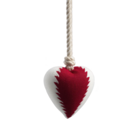 Fabric heart ornament with red and white design hangs from rope, showcasing handmade, rustic charm. heart features zigzag pattern, adding touch of whimsy png