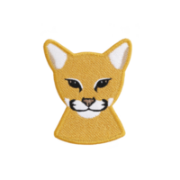 Cute embroidered patch of cat face with yellow fur and white accents, featuring black eyes and playful expression. patch is isolated on transparency background png