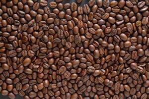 Coffee beans background. Top view coffee beans with copy space area for your text. Close up image. photo