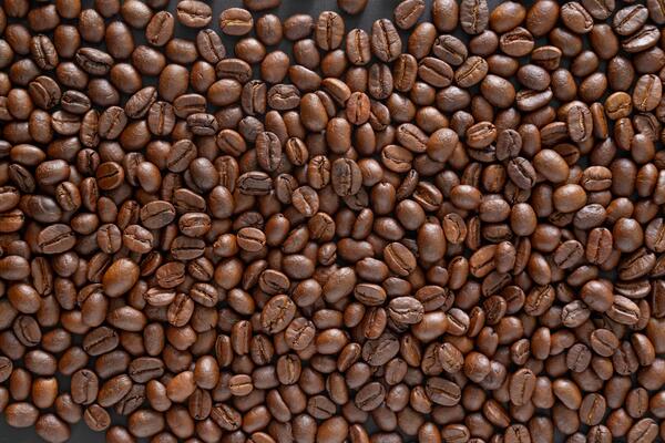 Coffee beans background. Top view coffee beans with copy space area for your text. Close up image.