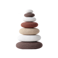 Stack of smooth, rounded pumice stones varying earthy tones is arranged balanced tower. stones range from white to dark brown, creating gradient effect. arrangement conveys sense of calm png