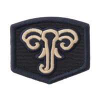 This features embroidered patch with stylized ram head design, showcasing intricate stitching in beige and navy blue. patch has shield like shape, giving it bold and distinctive appearance png