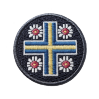 This shows circular embroidered patch featuring blue and yellow cross with white flowers and red centers transparency background. design is intricate and colorful.Patch with blue and yellow cross png
