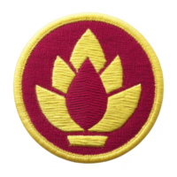 This shows circular embroidered patch with red background and yellow emblem resembling stylized flame or leaf design. patch has yellow border png