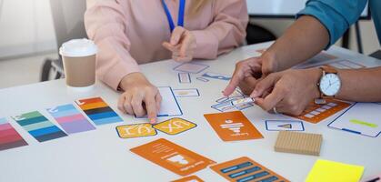 Collaborative Design Meeting. Professionals discussing and reviewing design concepts and color palettes. photo