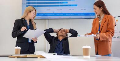Team Dynamics and Stress Management. Professionals navigating project challenges in a collaborative office. photo