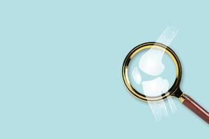 Magnifying Glass Focuses on Human Knee Joint with Polygon Bone Structure on Blue Background for Medical Concept photo