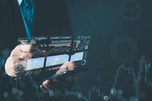 Business online digital market. businessman use graph report and progress of business and analyze financial,with investment. Use technology to plan strategy to success goal and growth stock photo