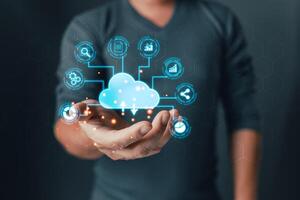 cloud technology.man hold icon cloud computing diagram. data storage.secure backup and consistency networking and internet service concept.implementing storage technology in business photo