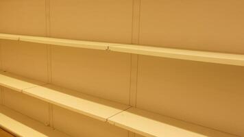 Empty shelves in a store create a sense of scarcity video