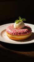 Delicious Pink Donut with Sprinkles and Ice Cream a sweet treat photo