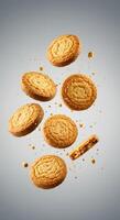 Delicious Golden Brown Cookies Falling Against a Grey Background photo