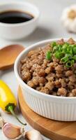 Delicious Ground Pork Dish Served in Bowl with Garlic and Soy Sauce photo