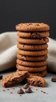 Delicious Chocolate Chip Cookies Stacked High on a Table photo