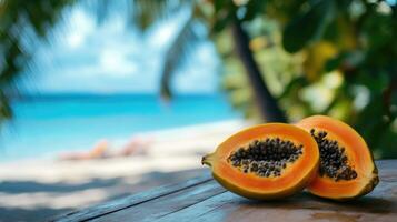 two halves vivid ripe papaya fruit displayed on a sunny tropical tabletop by a beach photo