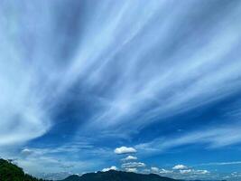 mountain view from the boat with blue sky background. photo