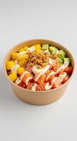 Delicious Salmon Poke Bowl with Mango Avocado Sesame Seeds and Crispy Onions photo